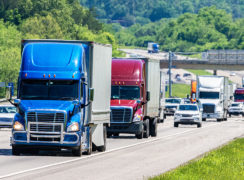 heavy traffic with tractor trailers and semi trucks on highway - missouri truck accident attorneys