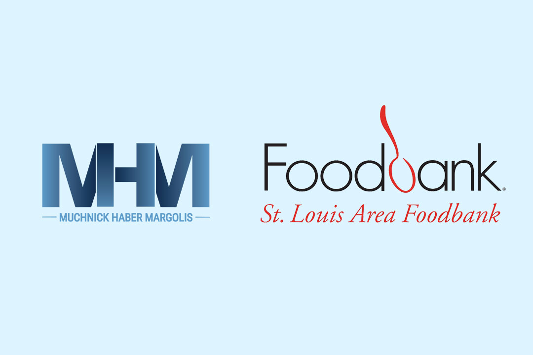 MHM logo paired with the St. Louis Area Foodbank logo on a blue background.