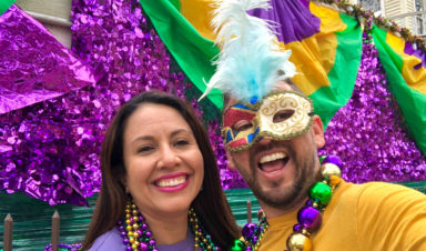 two friends celebrating at Mardi Gras parades